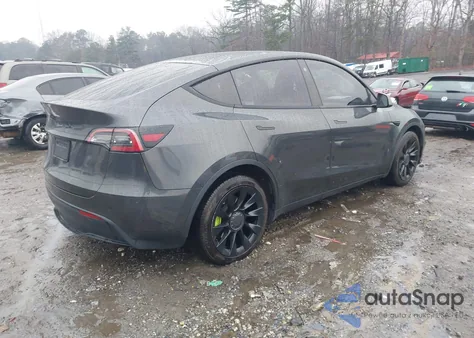 2021 Tesla Model Y Standard Range Rear-Wheel Drive from USA, damaged, VIN 5YJYGDED2MF174984